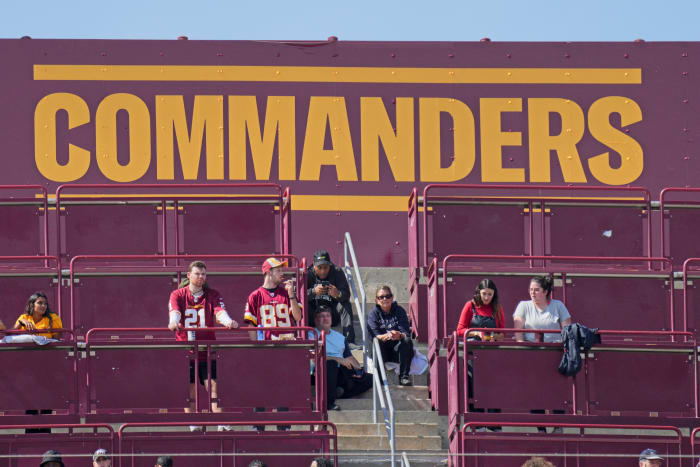 Washington Commanders logo and fans
