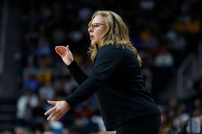 UCLA head coach Cori Close works the sideline during a game.