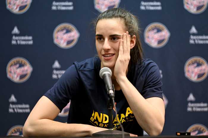 WASHINGTON, DC - JUNE 07: Caitlin Clark #22 of the Indiana Fever talks to the media before the game against the Washington Mystics at Capital One Arena on June 07, 2024 in Washington, DC.  NOTE TO USER: User expressly acknowledges and agrees that, by downloading and or using this photograph, User is consenting to the terms and conditions of the Getty Images License Agreement. (Photo by G Fiume/Getty Images)