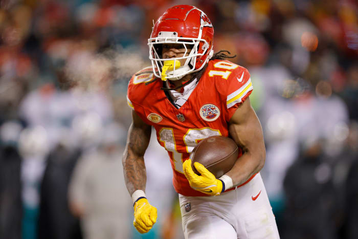 Chiefs running back Isiah Pacheco carries the ball against the Miami Dolphins.