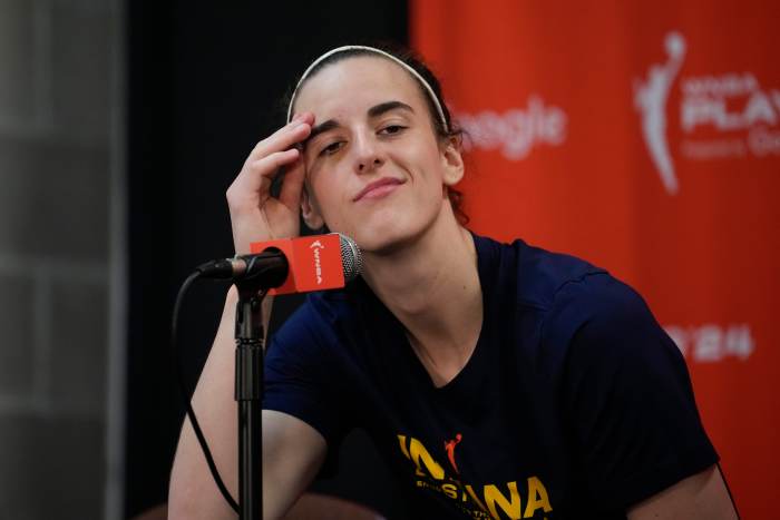 UNCASVILLE, CONNECTICUT - SEPTEMBER 25: Caitlin Clark #22 of the Indiana Fever looks on during a press conference after losing 81-87 to the Connecticut Sun in Game Two of the 2024 WNBA Playoffs first round at Mohegan Sun Arena on September 25, 2024 in Uncasville, Connecticut. (Photo by Joe Buglewicz/Getty Images)