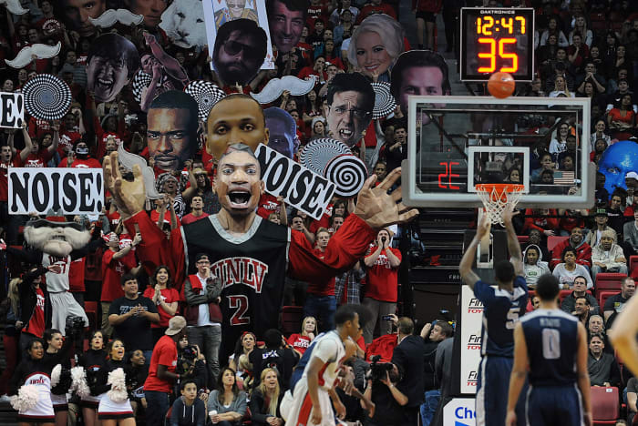 Utah State basketball player Jarred Shaw shoots a free throw.