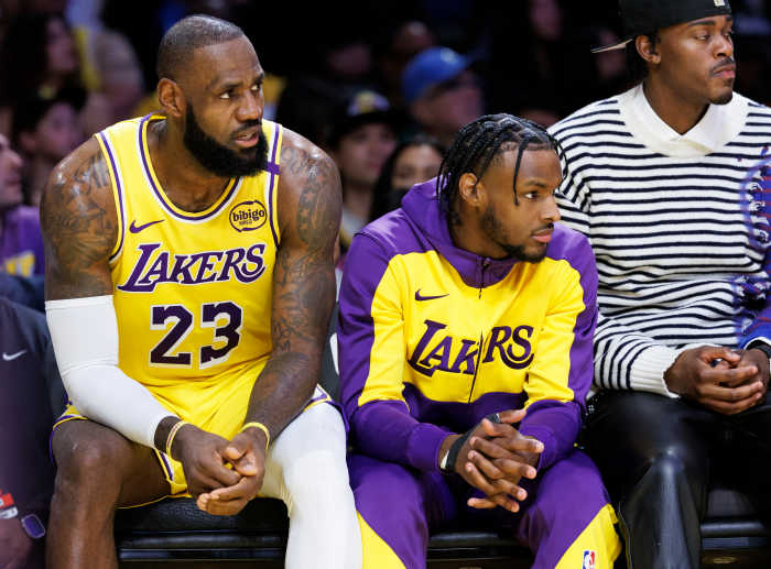 LeBron and Bronny on the court.