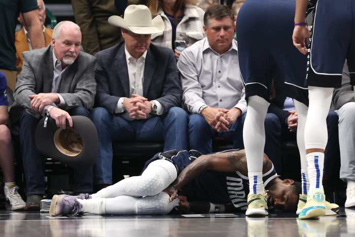 Mavericks guard Kyrie Irving suffers an injury.