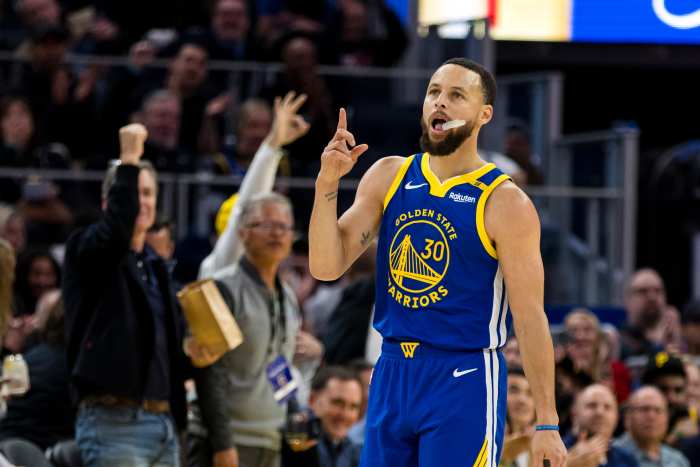 Golden State Warriors guard Stephen Curry (30) reacts after hitting a three-point shot against the Portland Trail Blazers.