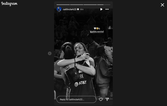 Caitlin Clark hugs Gabbie Marshall.