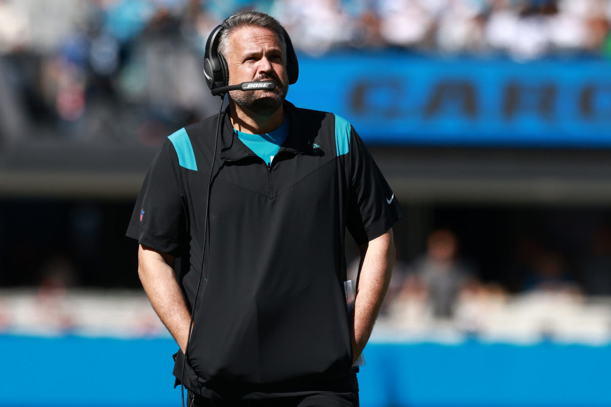 Panthers head coach Matt Rhule looks on.