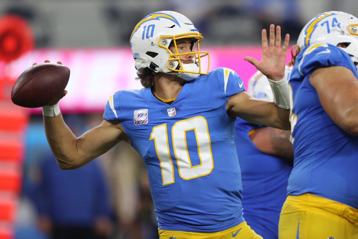 Justin Herbert winds back on a throw for the LA Chargers