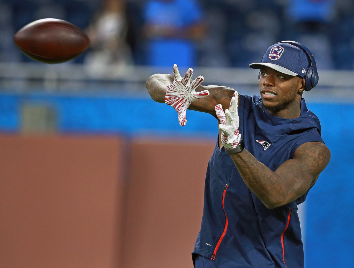Josh Gordon catches a pass ahead of New England Patriots Vs Detroit Lions At Ford Field