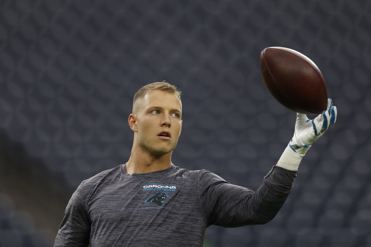 Christian McCaffrey warming up for the Panthers.