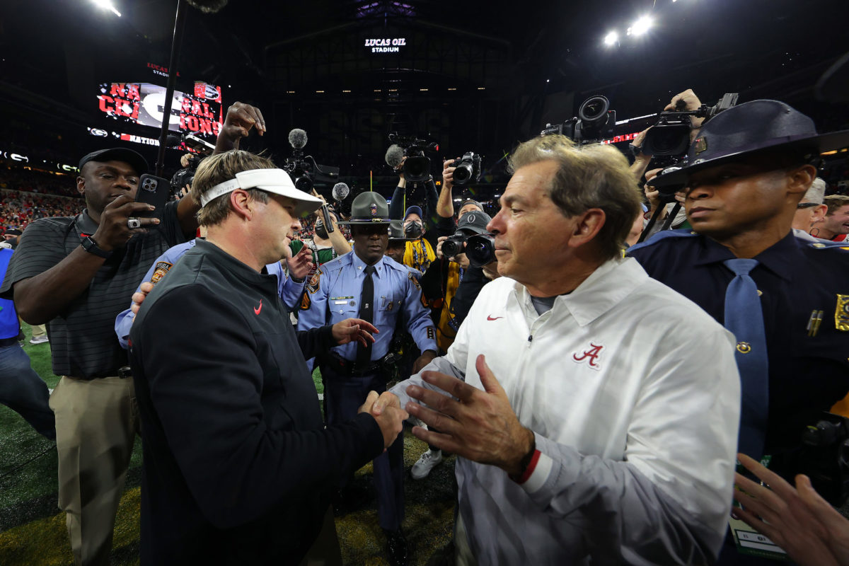 Nick Saban shaking hands with Kirby Smart.