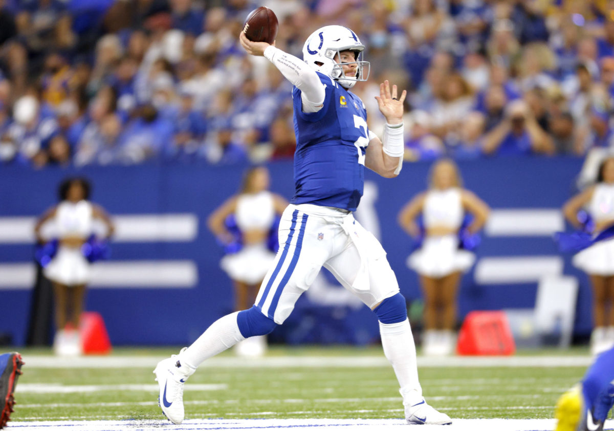 Colts quarterback Carson Wentz throws a pass in a game.