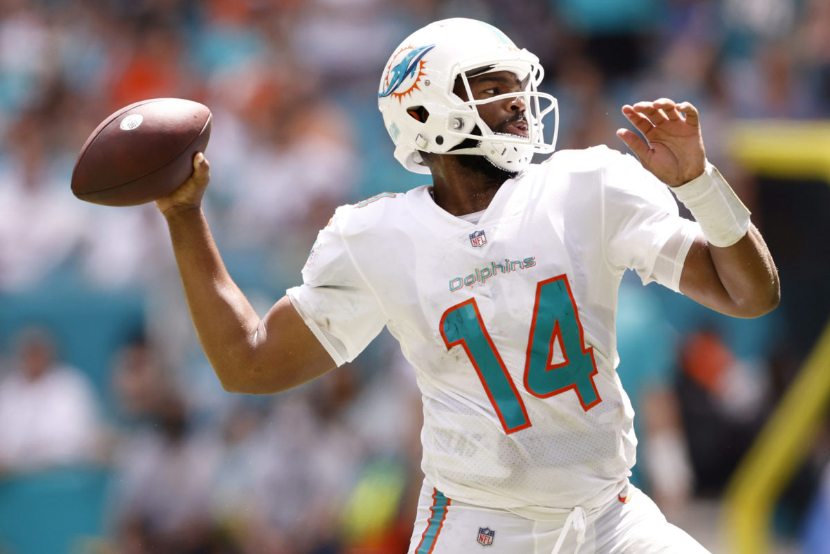 Miami Dolphins quarterback Jacoby Brissett (14) throws during NFL