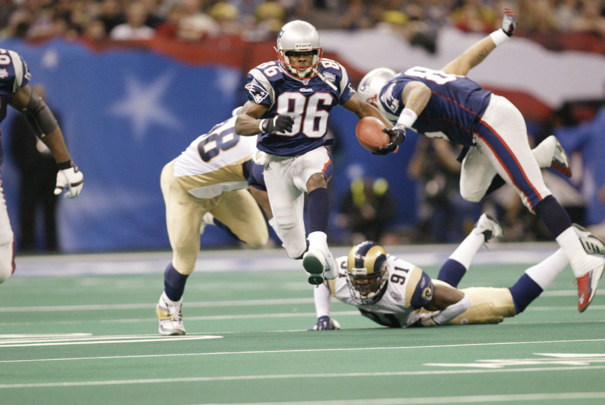 Patriots receiver David Patten runs with the ball during Super Bowl XXXVI.