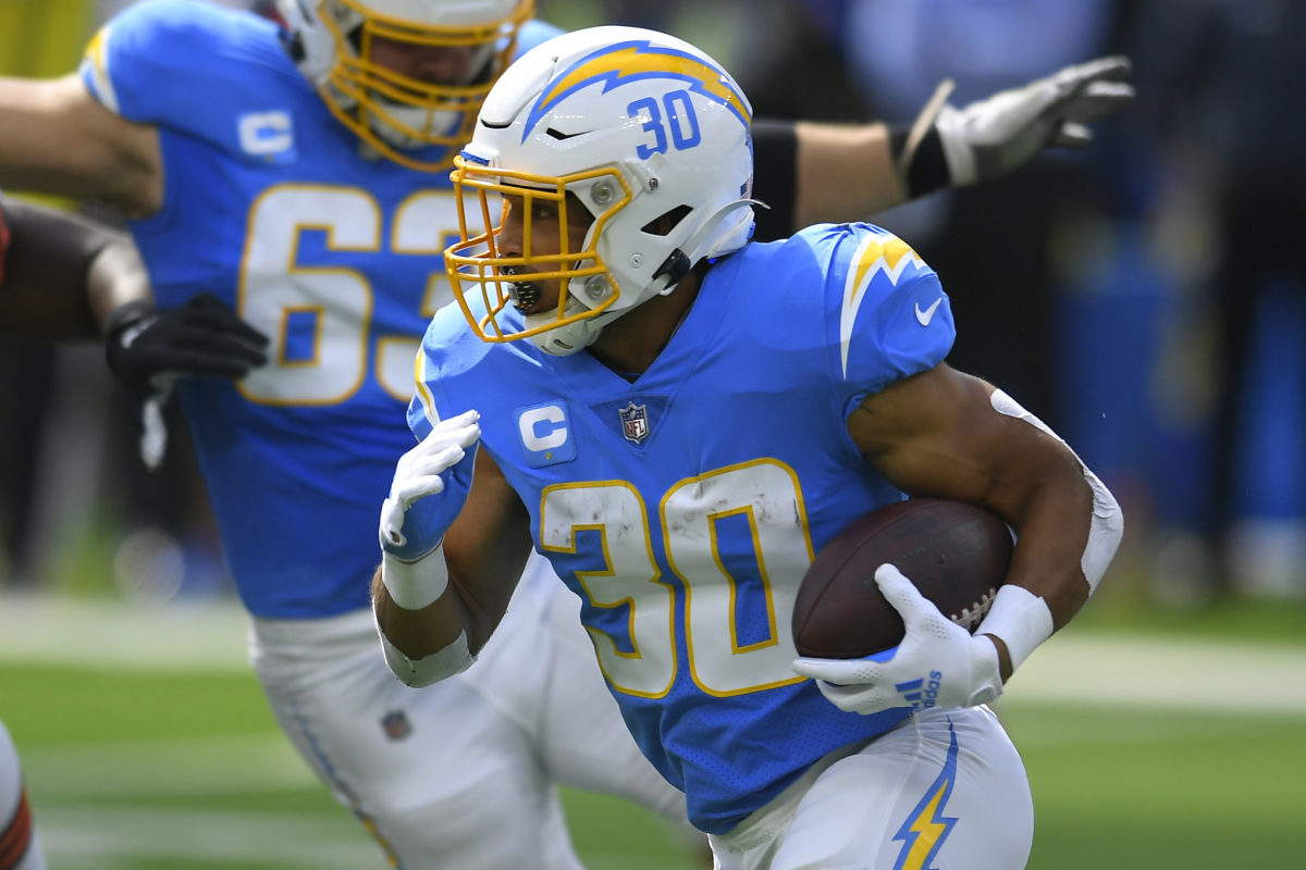 Chargers running back Austin Ekeler carries the ball.