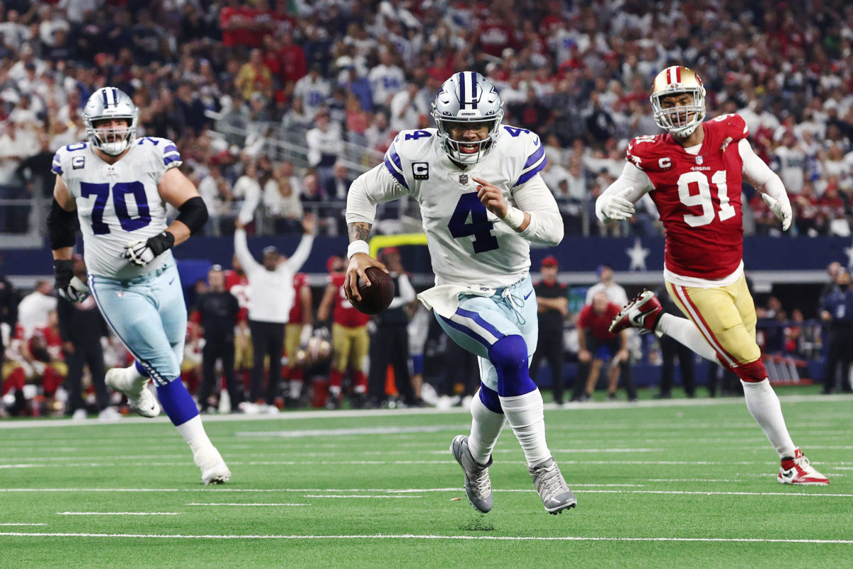 Dak Prescott of the Dallas Cowboys rushes for a touchdown against