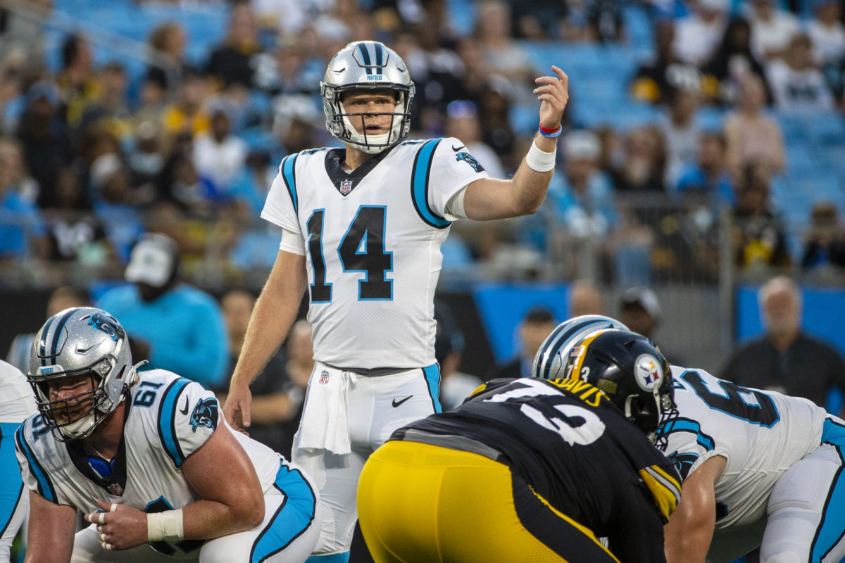 Sam Darnold takes control of the huddle for the Panthers.