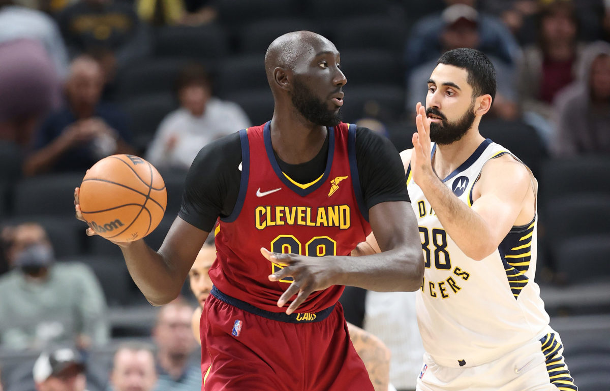 Cleveland Cavaliers center Tacko Fall holds the ball in the post.