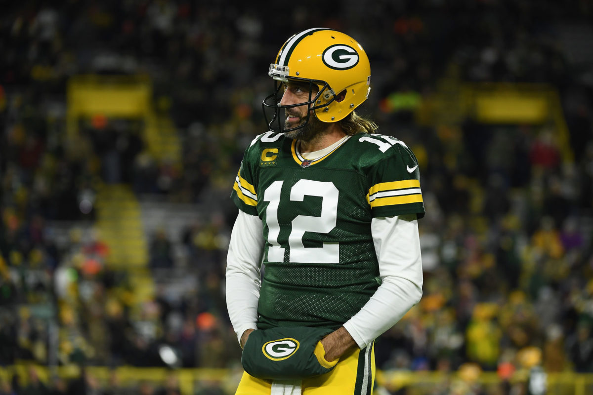 GREEN BAY, WI - OCTOBER 16: Green Bay Packers quarterback Aaron Rodgers  (12) passes during a game between the Green Bay Packers and the New York  Jets at Lambeau Field on October