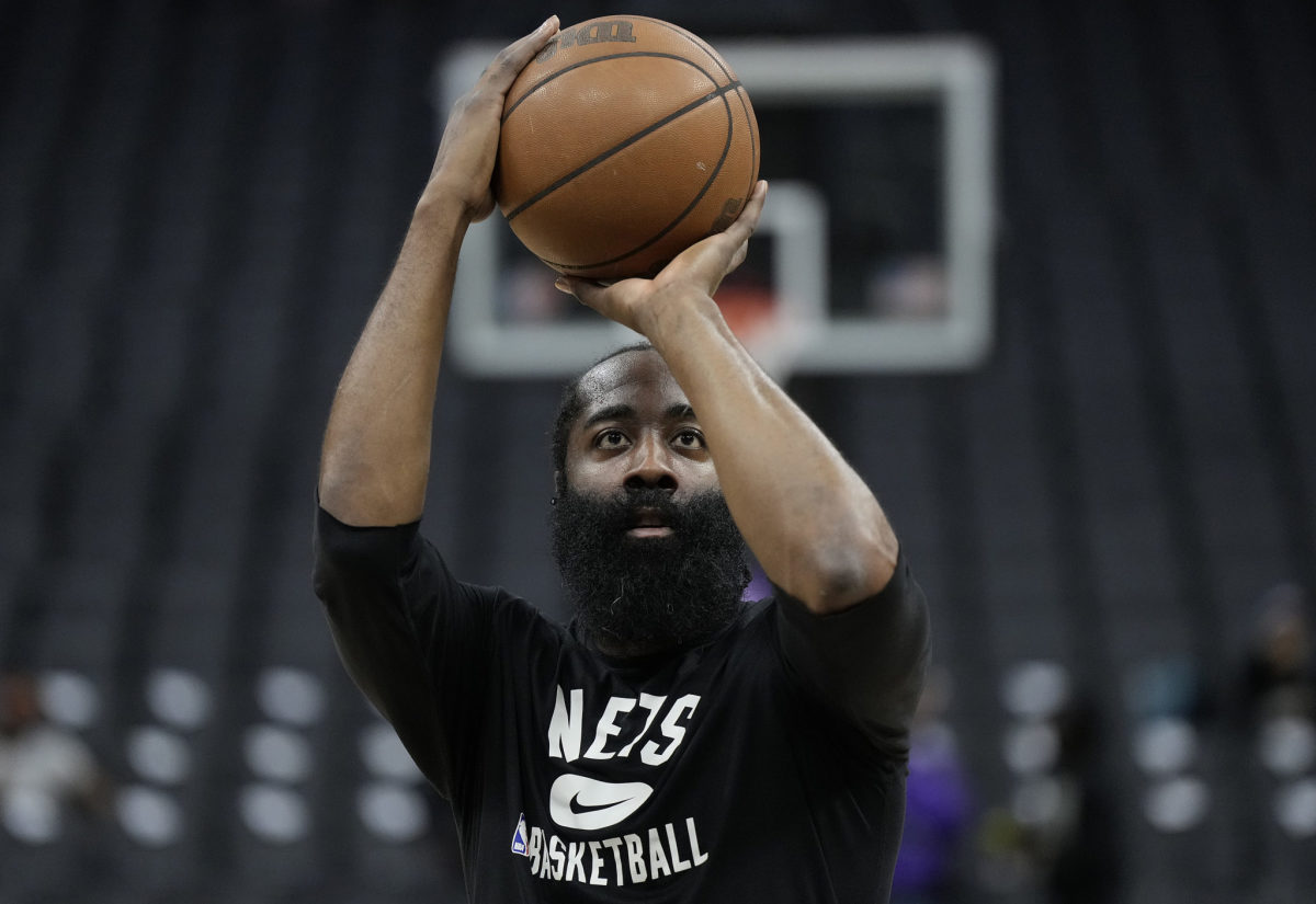 Nets star James Harden warms up.