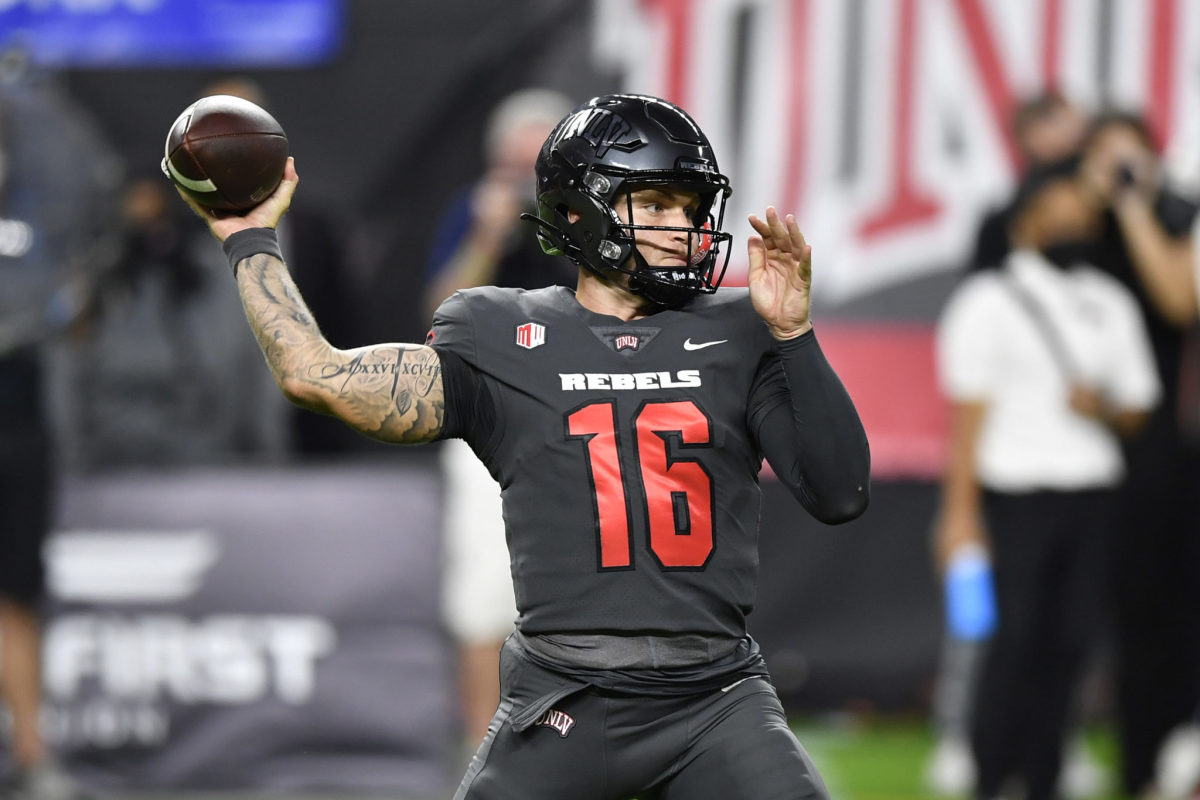 Tate Martell throws a pass for the UNLV Rebels.