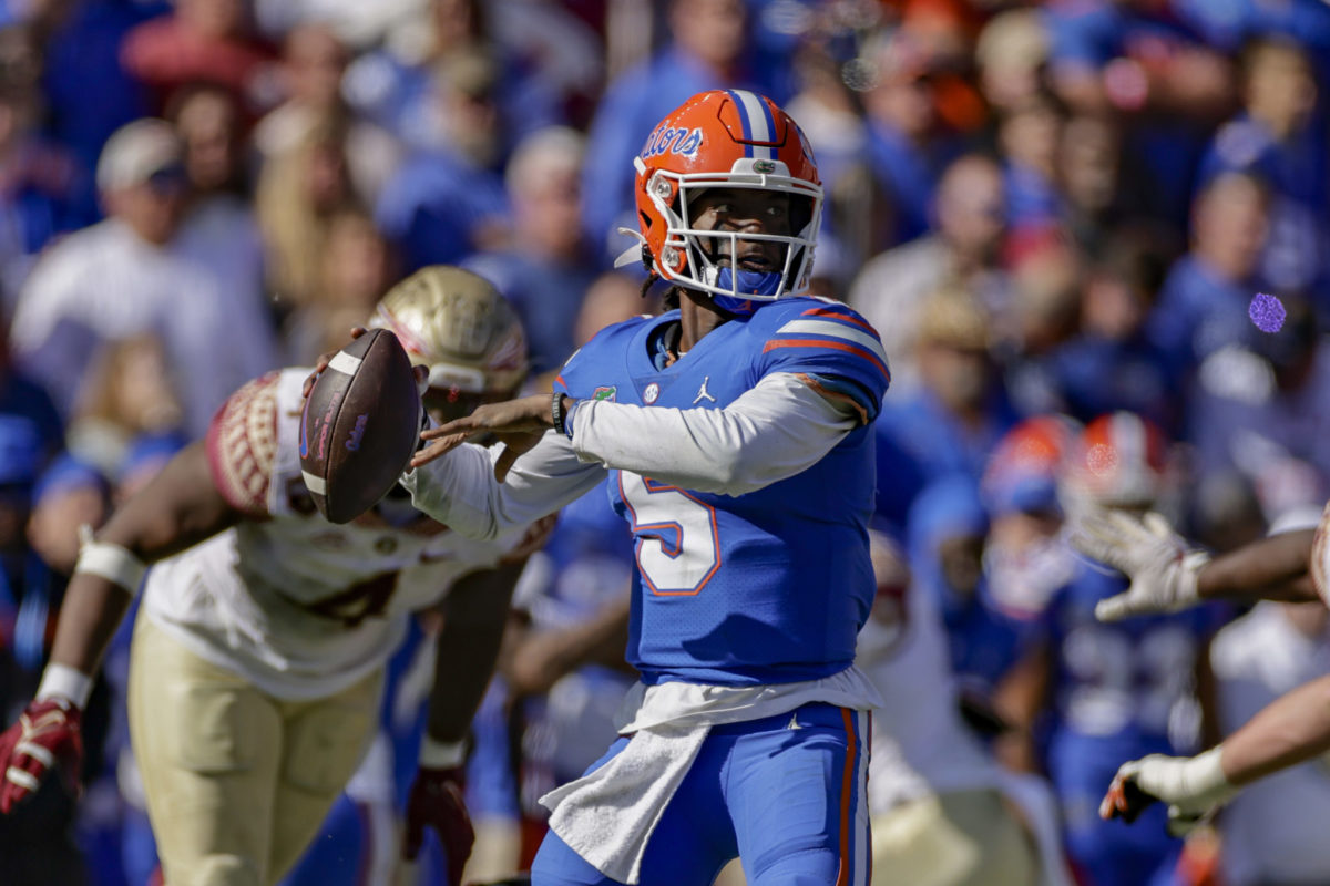Emory Jones attempts a pass for Florida.