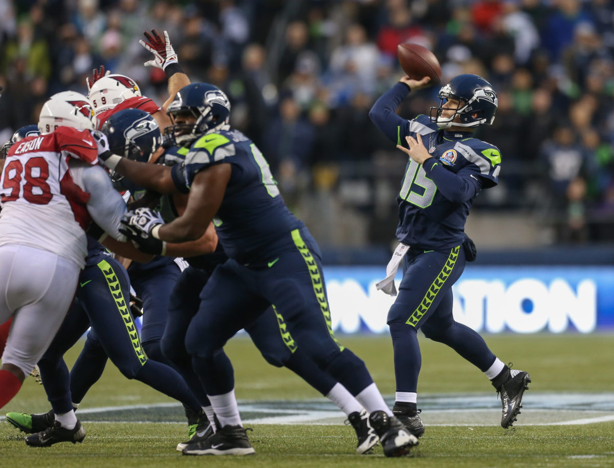 Matt Flynn throws a pass for the Seahawks in a game.