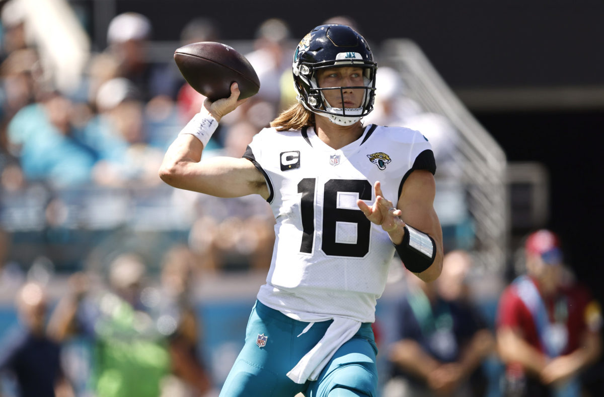 Trevor Lawrence throws a pass during a Jaguars game.