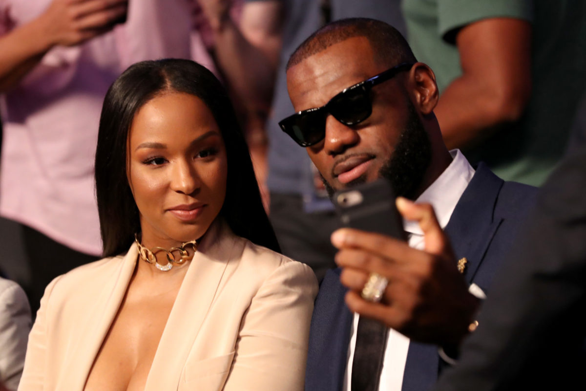 LeBron James taking a selfie with his wife.