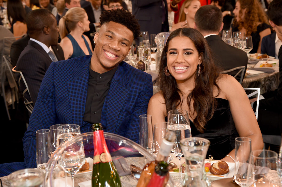 Giannis Antetokounmpo at the NBA award ceremony with Mariah Riddlesprigger.