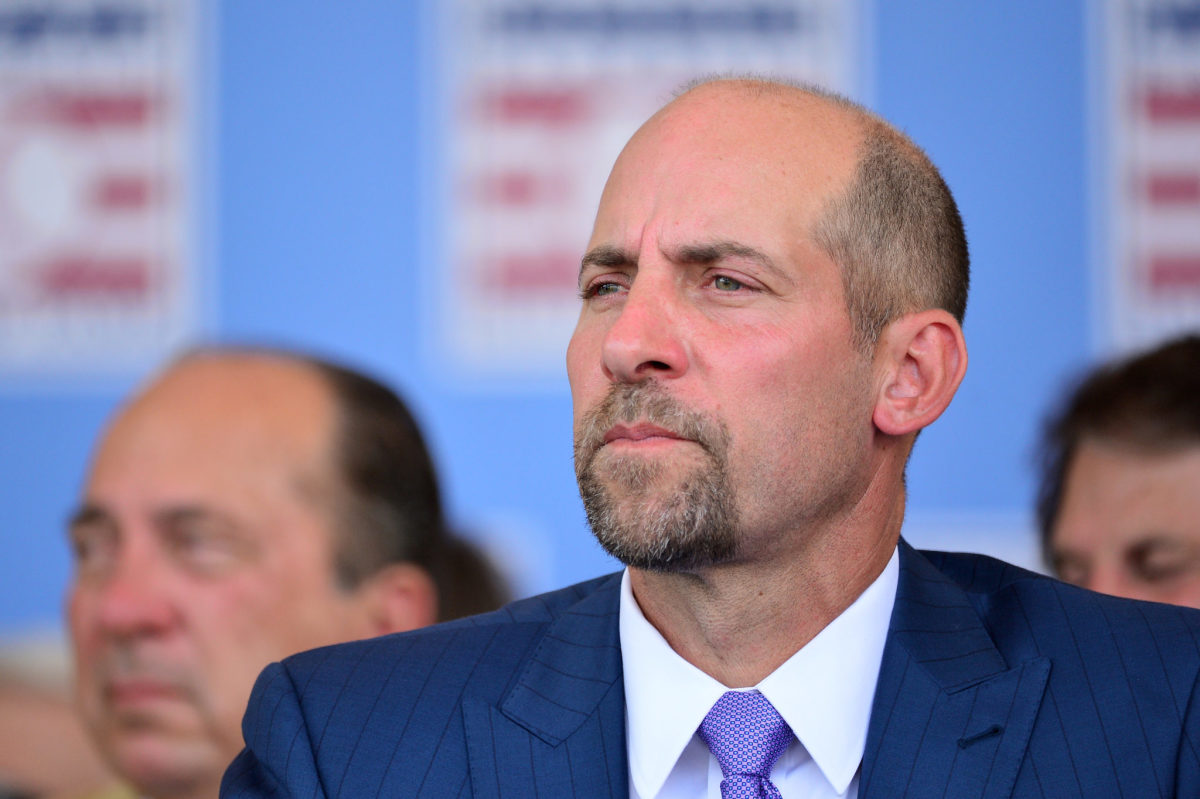 John Smoltz sits during the Hall of Fame ceremony.