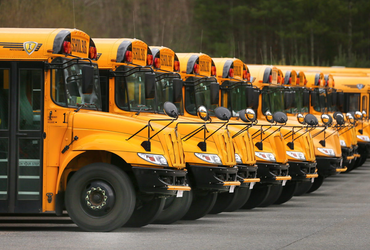 High school buses on display.