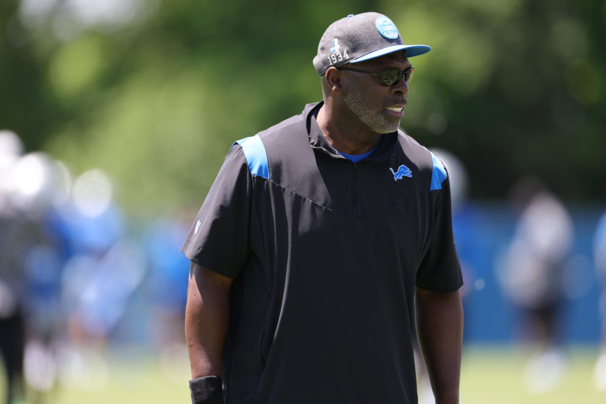Anthony Lynn on the field for the Lions.