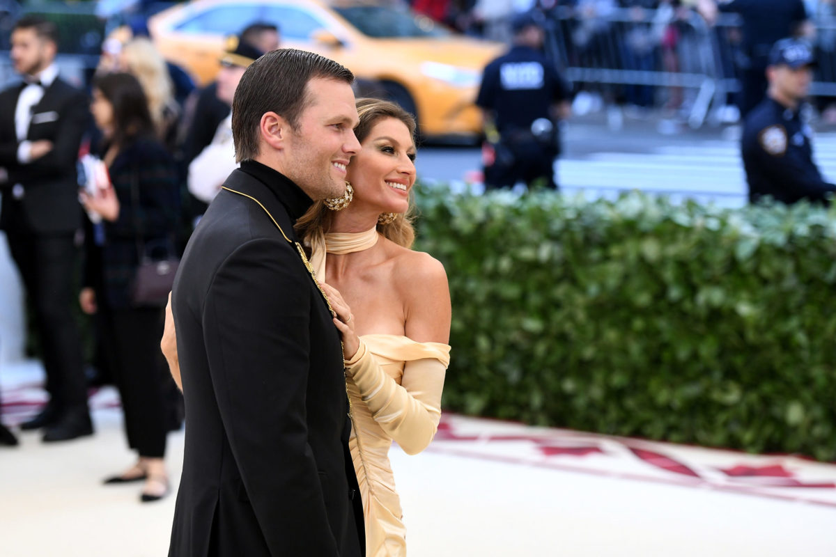 Tom Brady and Gisele dressed up at an event.