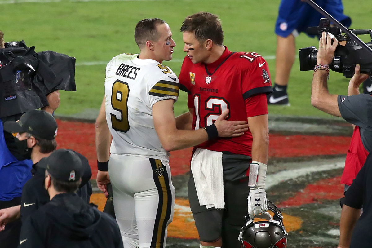 Drew Brees and Tom Brady speak after a game.