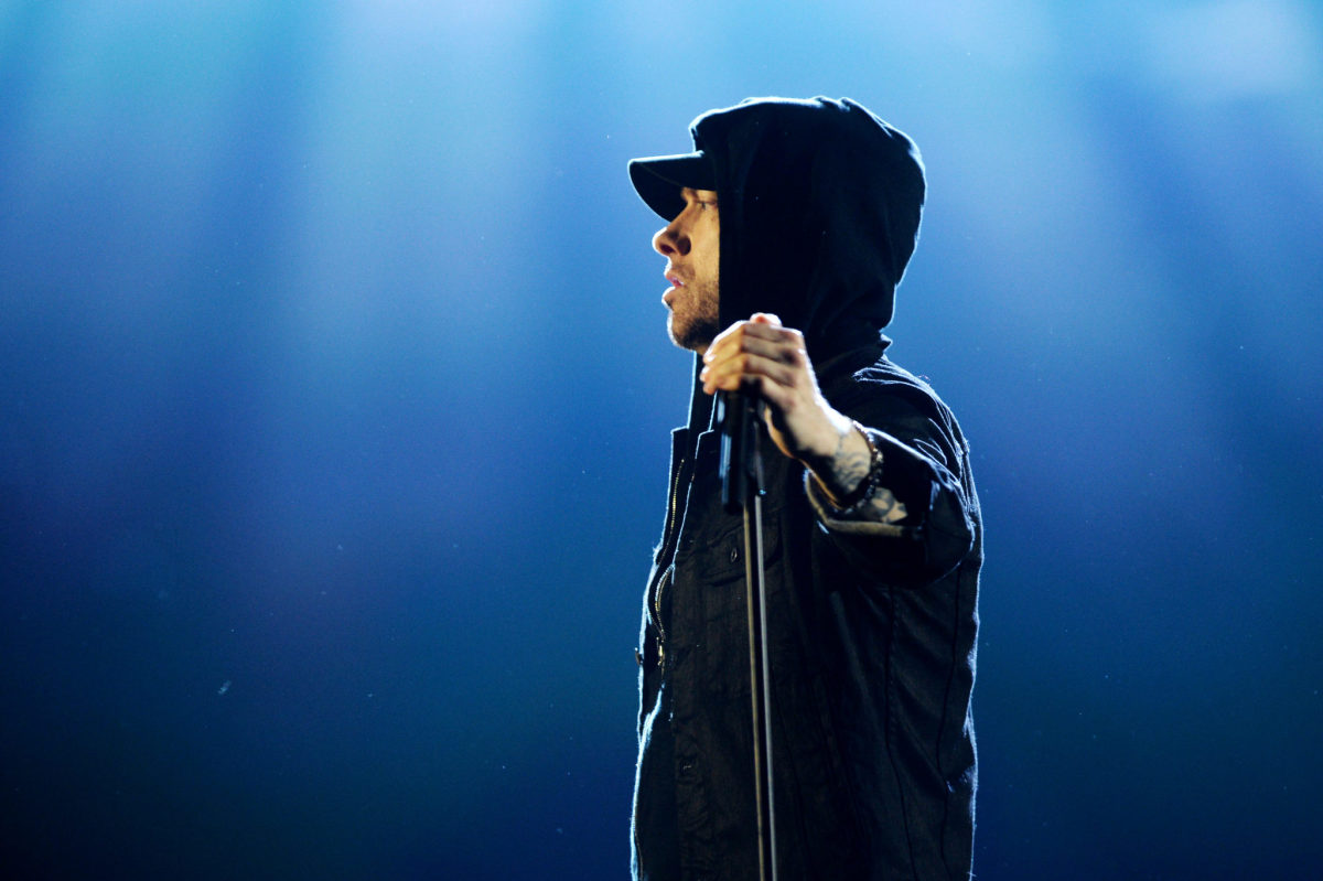 Eminem performing on stage.