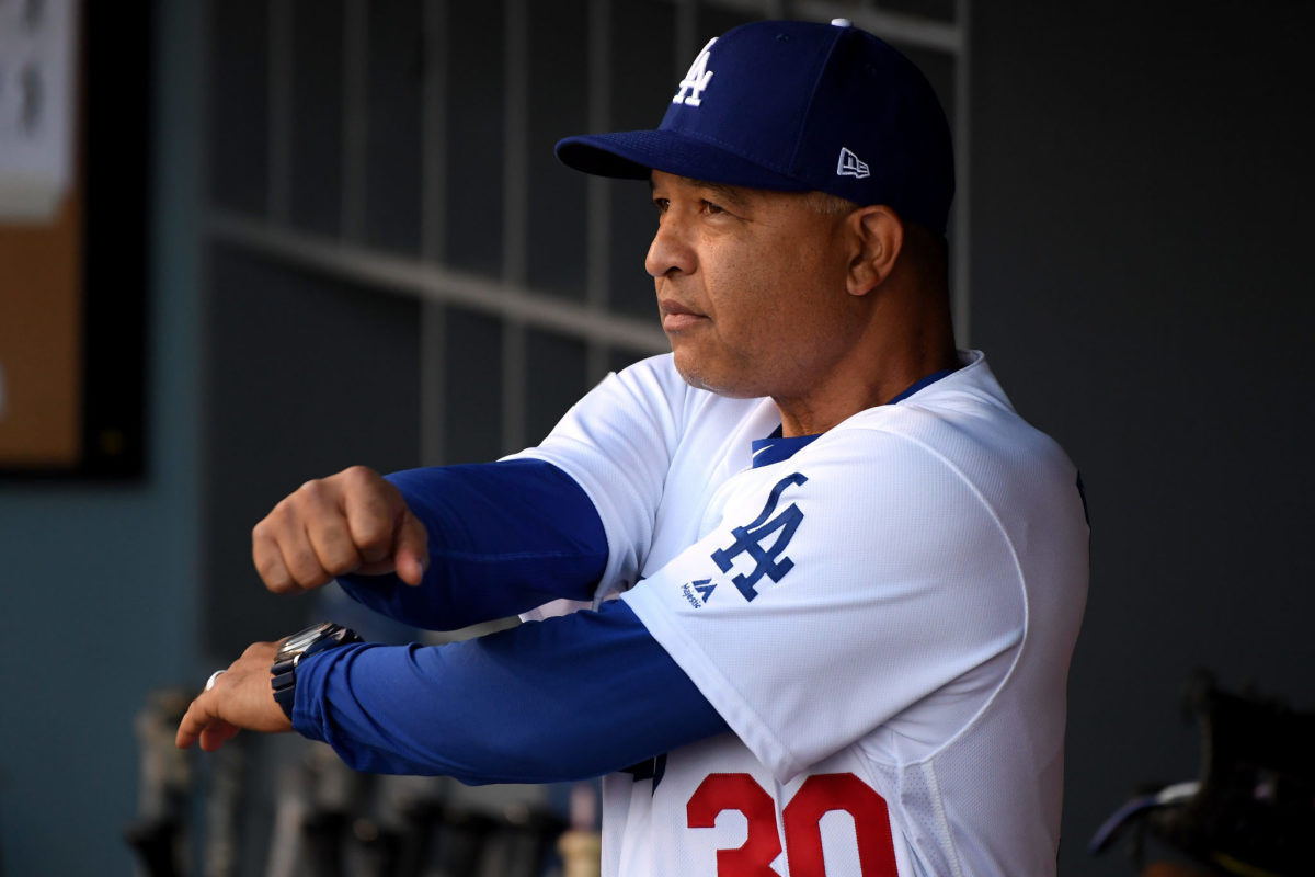 Dave Roberts sitting in the dugout.