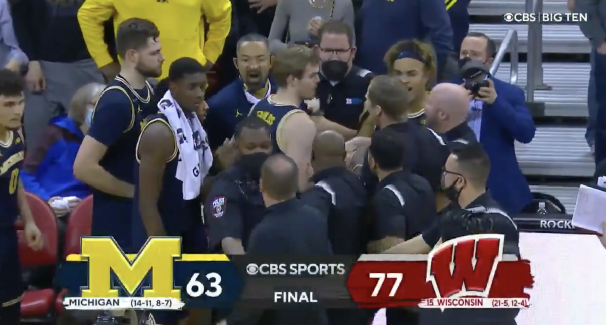 Juwan Howard appears to throw a punch at Wisconsin.