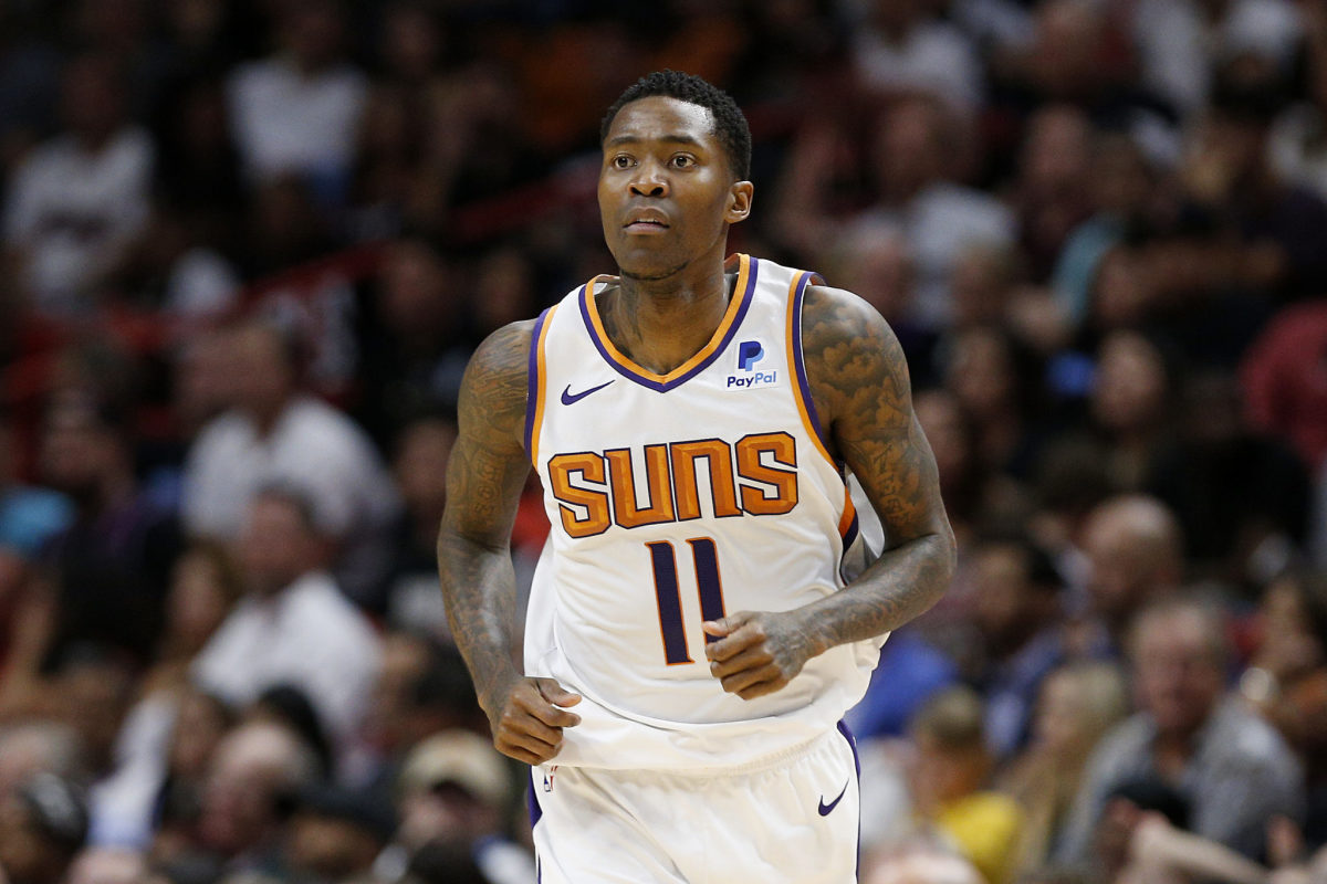 Jamal Crawford runs down the court in a game for the Suns.