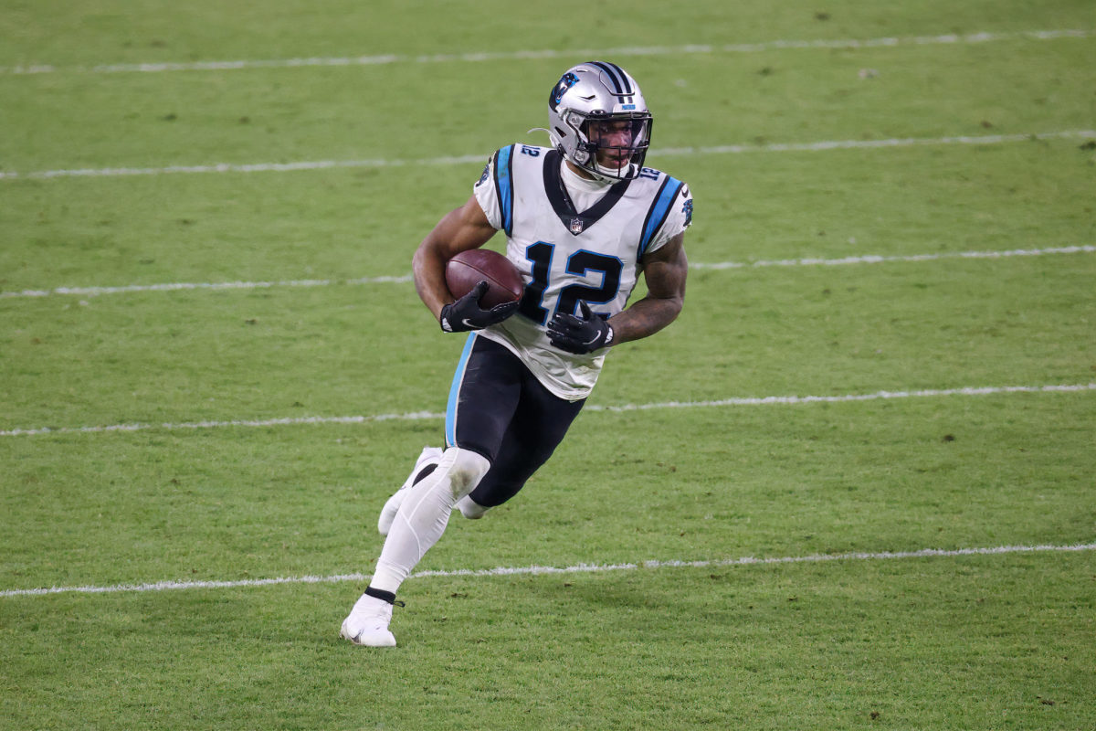 DJ Moore of the Carolina Panthers carrying the football.