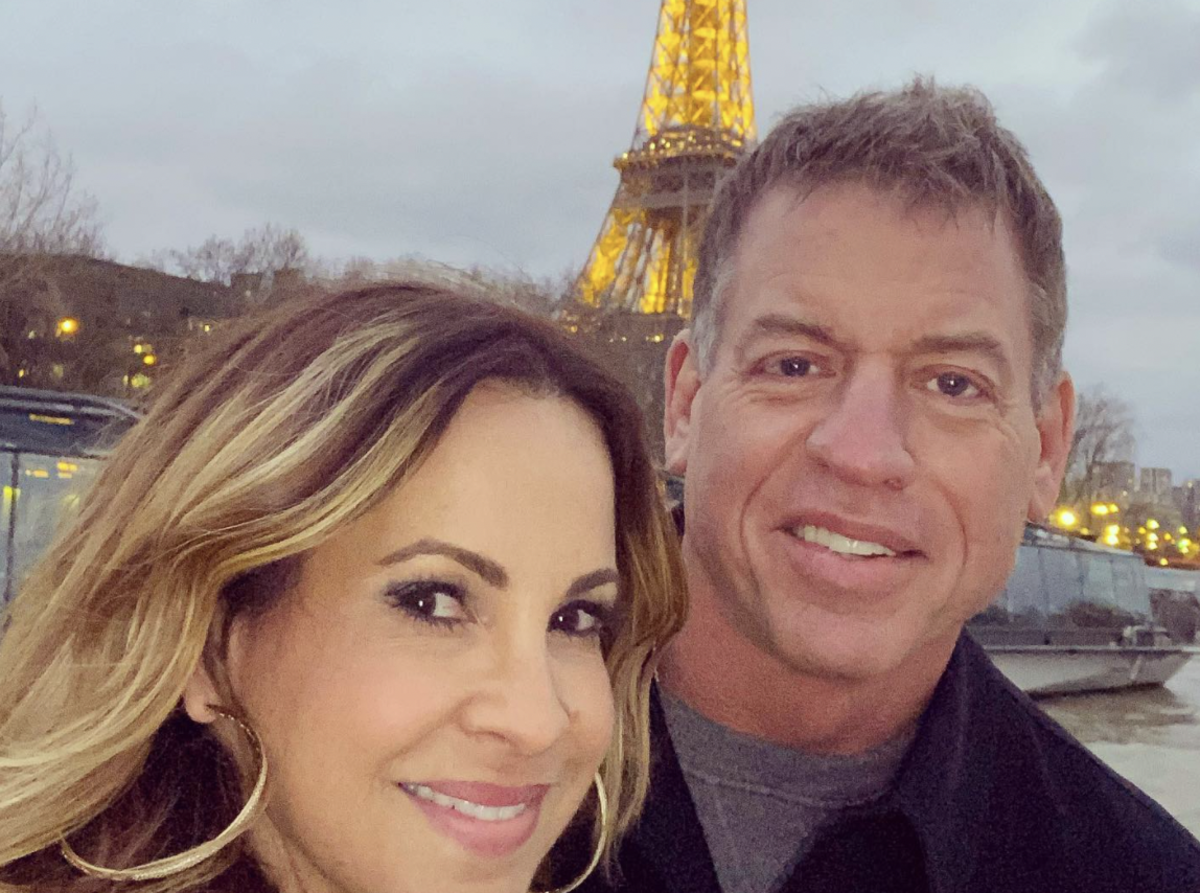 Troy Aikman and his wife.