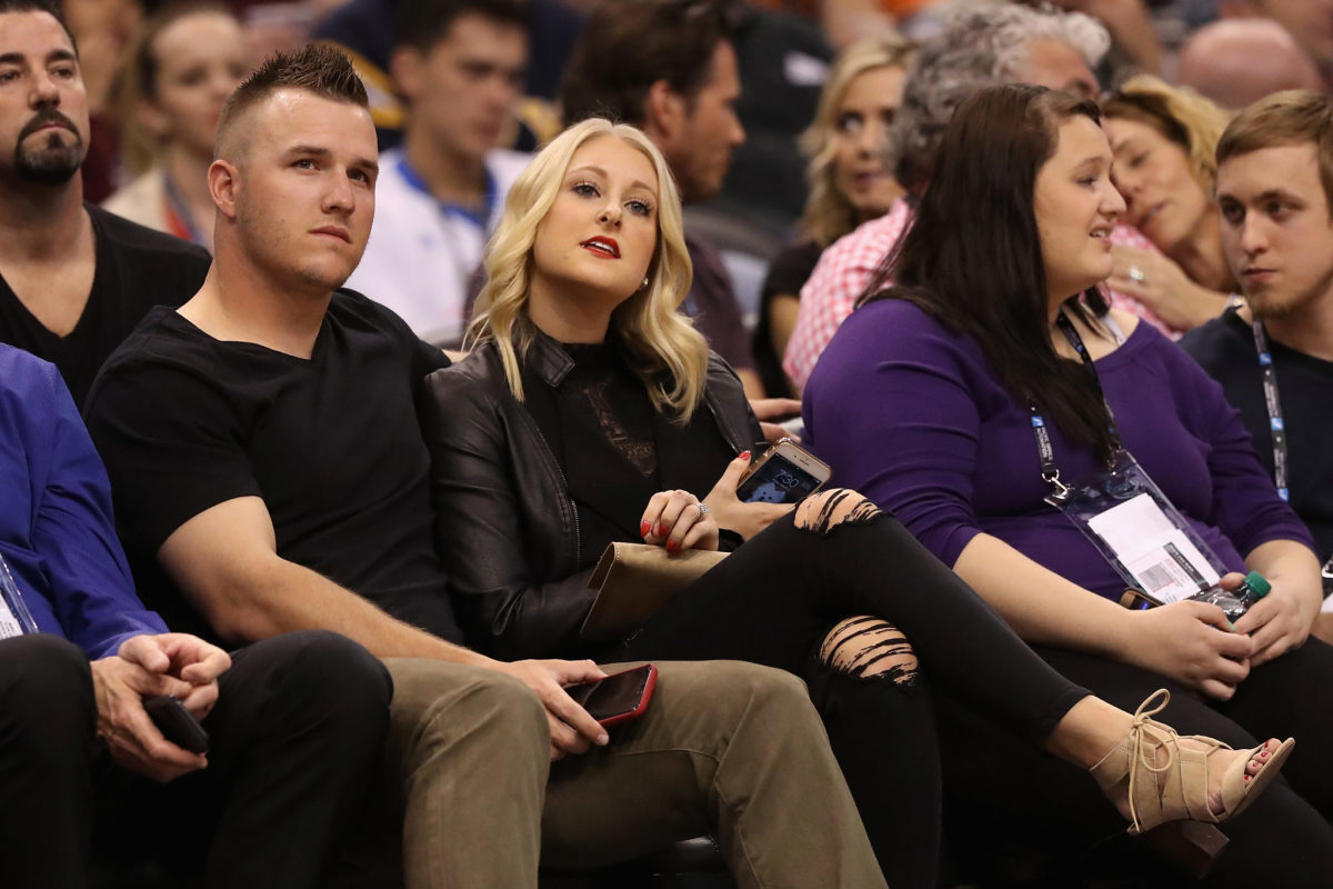 Mike Trout and his wife, Jessica, at an NBA game.