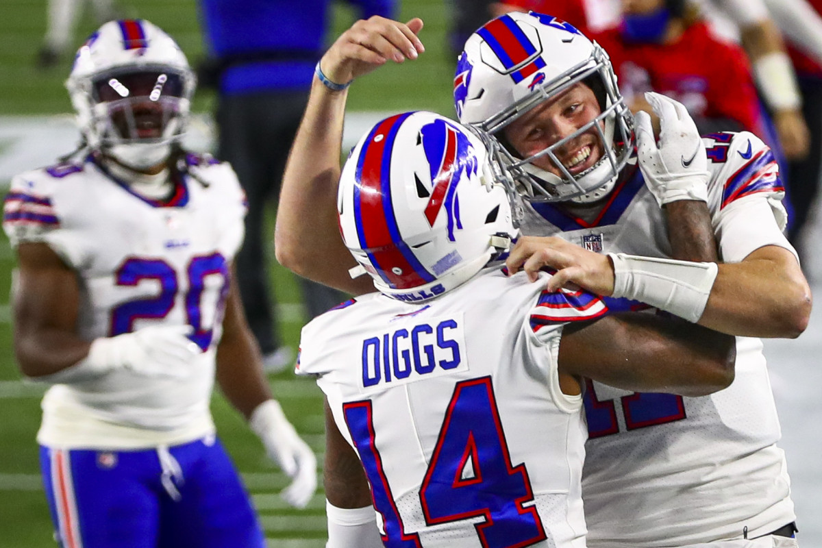 Buffalo Bills quarterback Josh Allen celebrates with wide receiver Stefon Diggs.
