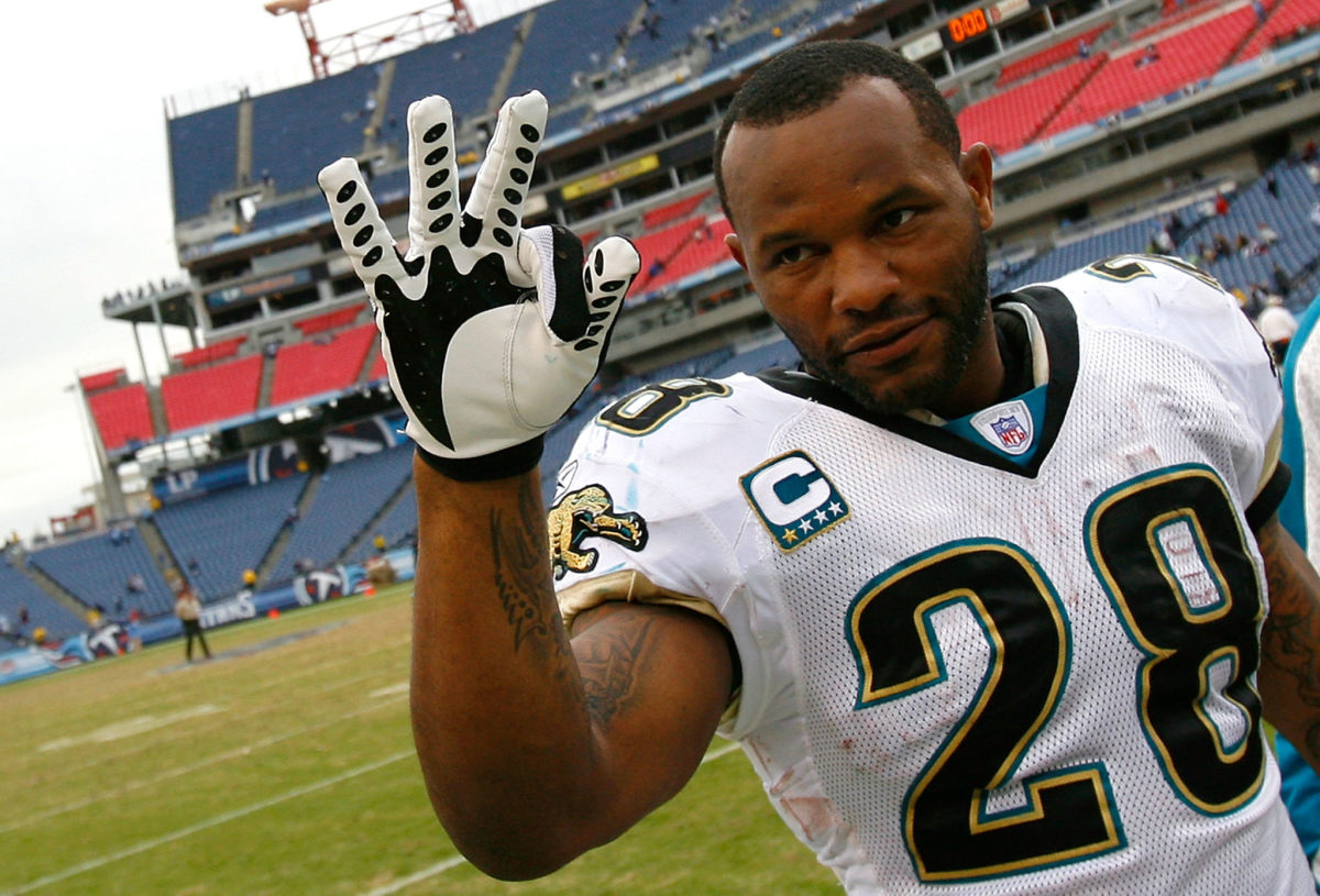 Fred Taylor waving to fans after a Jaguars game.