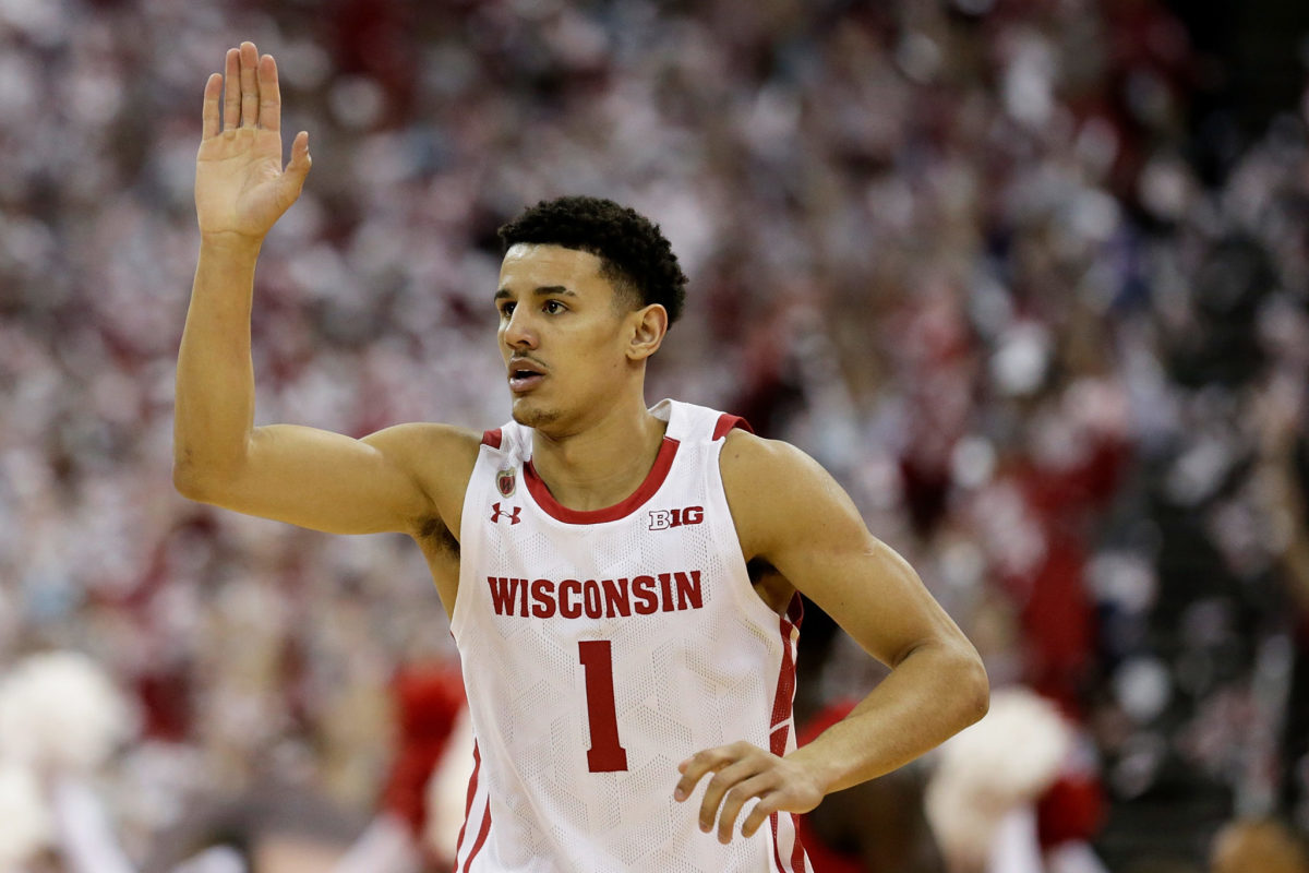 Wisconsin star Johnny Davis raises his hand for a high five.