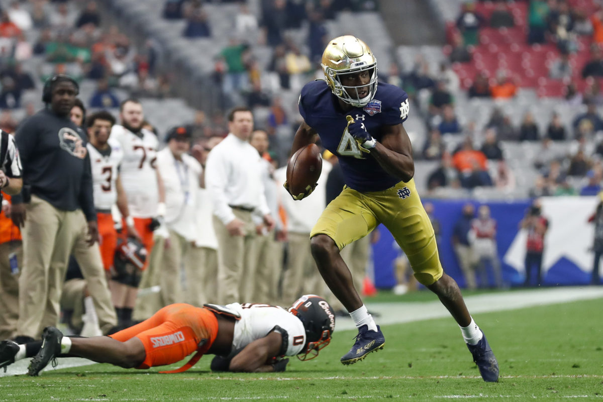 Kevin Austin Jr. of Notre Dame runs with the ball.