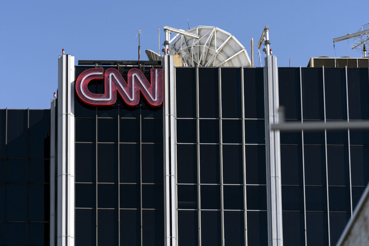 The CNN logo is seen atop its bureau in Los Angeles,