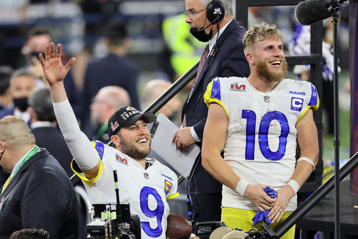 Rams stars Matthew Stafford and Cooper Kupp celebrate a Super Bowl LVI win.