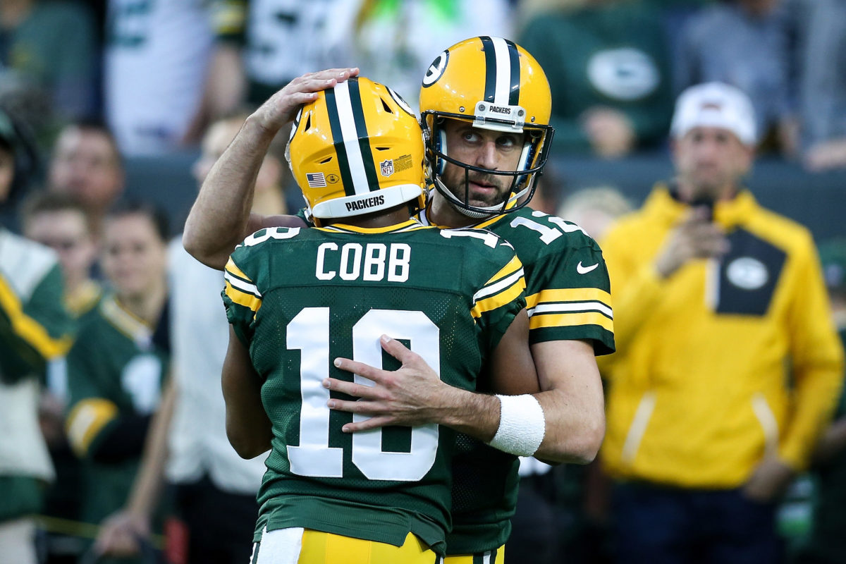Aaron Rodgers hugs Randall Cobb during a Green Bay Packers vs. Chicago Bears game.