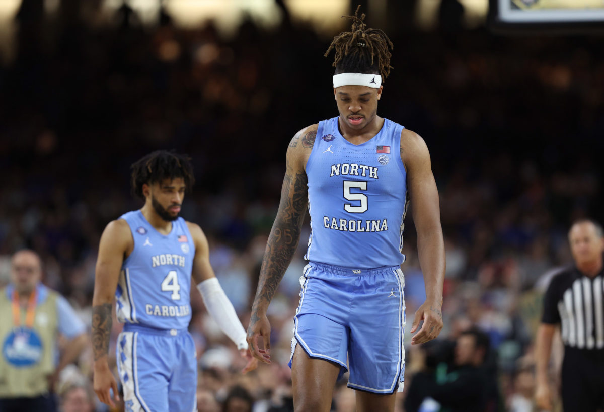 Armando Bacot walks down the court during the national championship game.